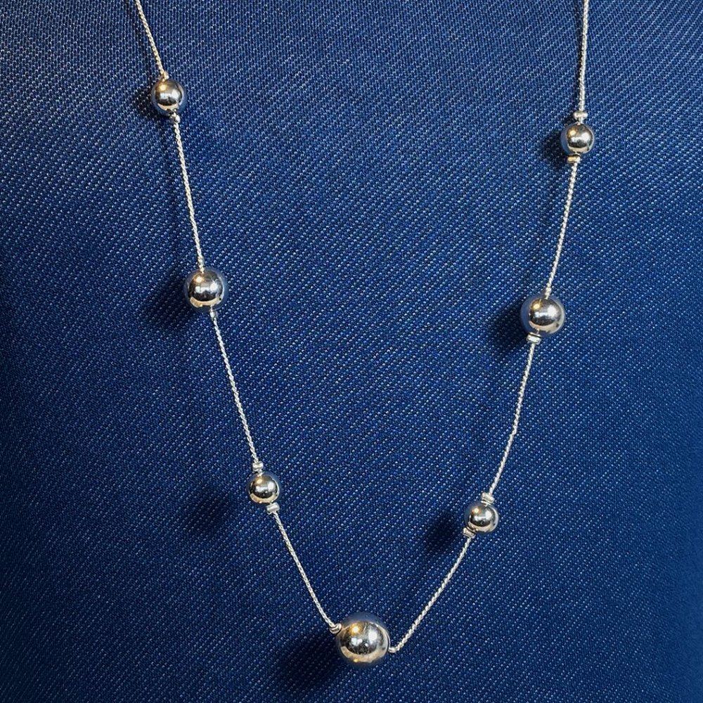 Silver tone, strand and beads costume jewelry, 35"